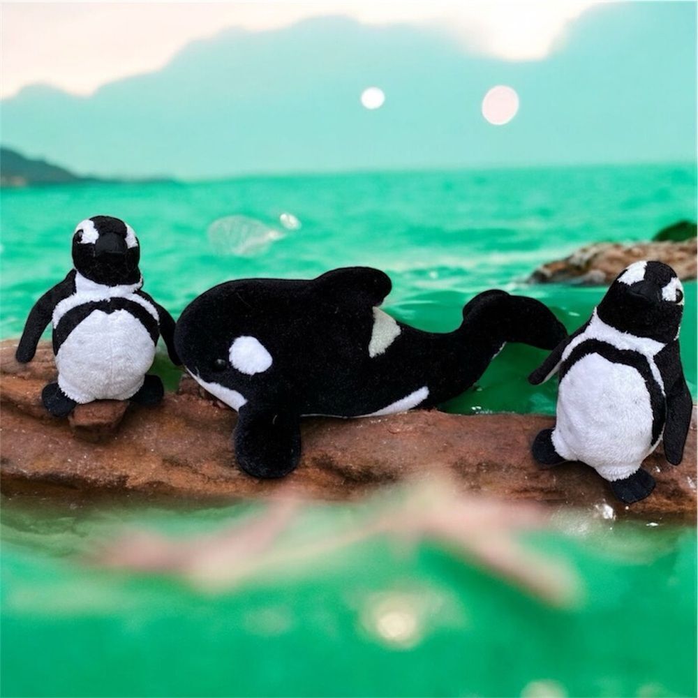 Lot of three stuffed animals from Sea World. One whale (Shamu) & 2 Penguins